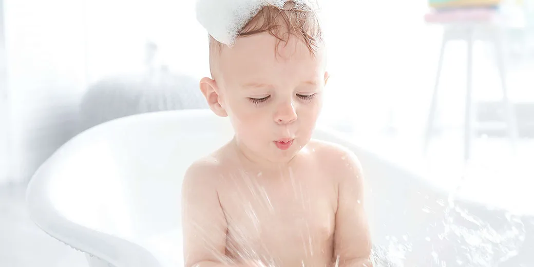 child in the tub